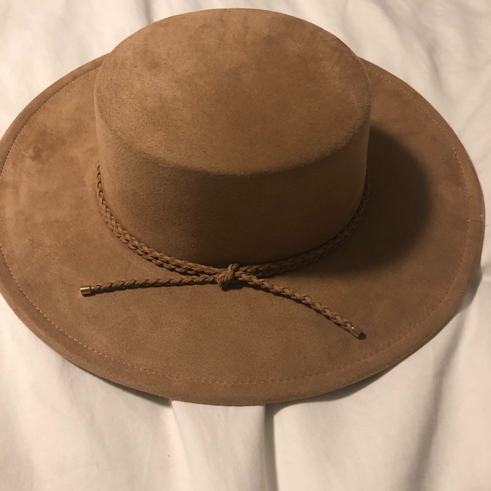 Camel color wide brine hat. Never been worn. One size